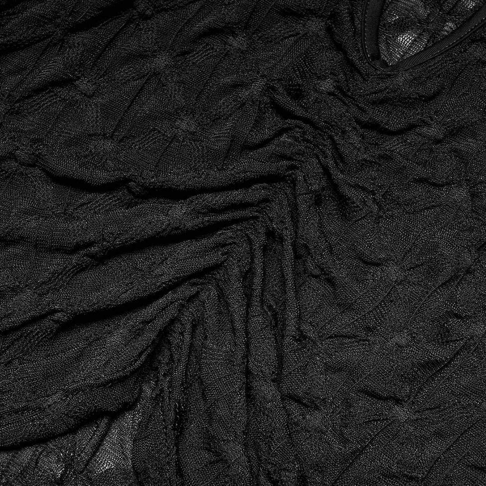 Black sheer lace crop top front ruched fabric close-up detail, showing gathered geometric pattern and textured design on bodice