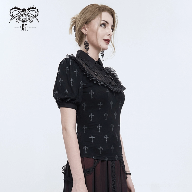 Black cross gothic blouse side three-quarter view, worn with black lace-trimmed tulle skirt in romantic gothic style