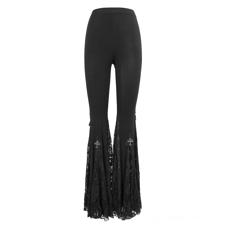 Flat lay product shot of black gothic cross lace bell-bottomed pants, front view showing metal cross ornaments on flared lace legs