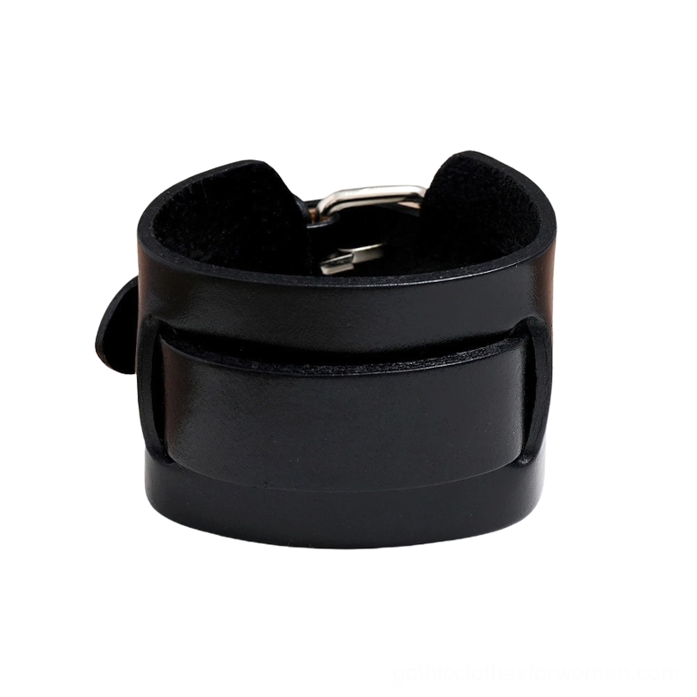 Black leather cuff bracelet front view detail, showing suede inner lining and metal buckle closure mechanism