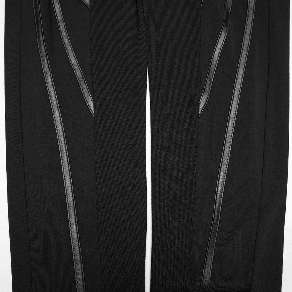 Close-up detail of black cyberpunk armor leggings side stripe and vertical seam showing smooth leather-style trim on knit fabric base