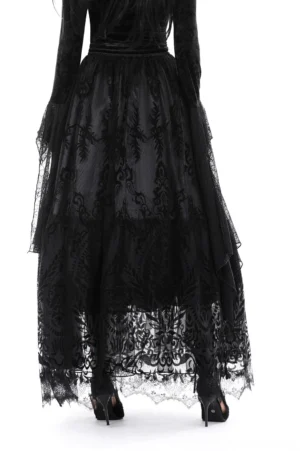 Black lace maxi skirt rear view on model - gothic tiered floral velvet overlay back