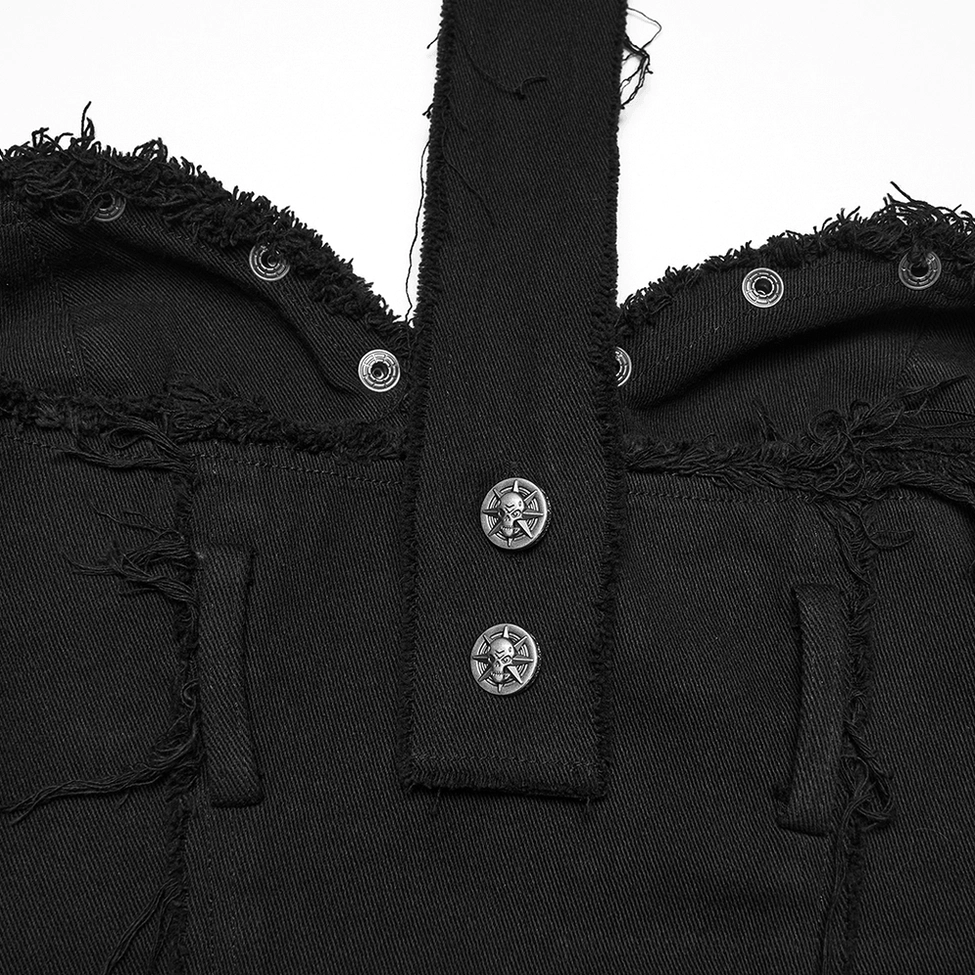 Close-up detail shot of black denim vest back strap fasteners showing skull metal buttons and frayed denim texture