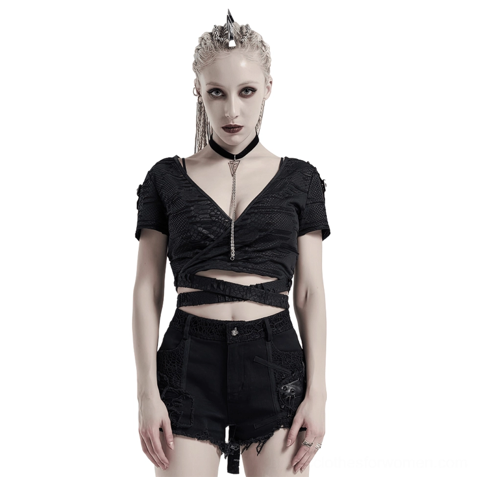 Black distressed v-neck gothic crop top front view with ripped mesh panels and faux leather back detail on model