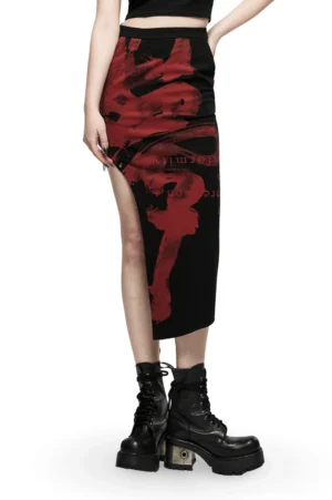 Black gothic asymmetric skirt with red dragon print, front view on model showing high side slit and chain details