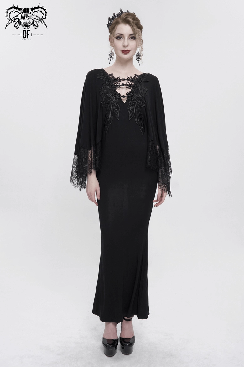 Close-up view of black gothic dress lace embroidery detail, featuring cross-inspired beading and floral pattern embellishment