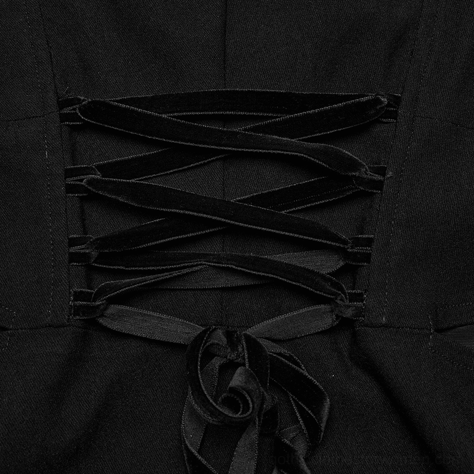 Close-up macro shot of velvet ribbon cross-lacing detail on black gothic dress corset back