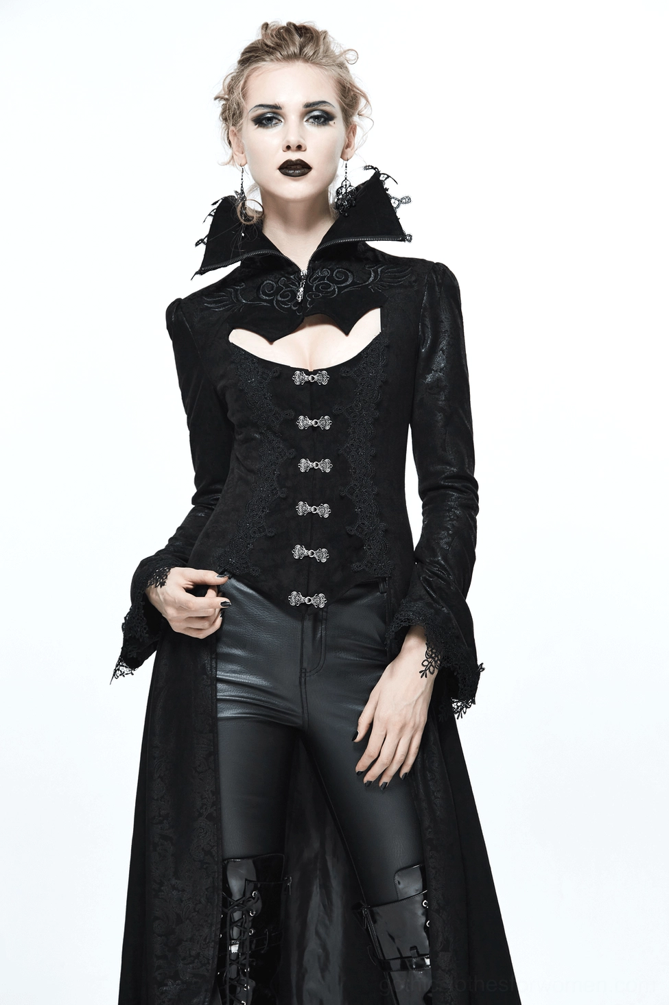 Black gothic embossed coat on model featuring ornate spiked collar, lace accents, button embellishments, and Victorian-inspired silhouette