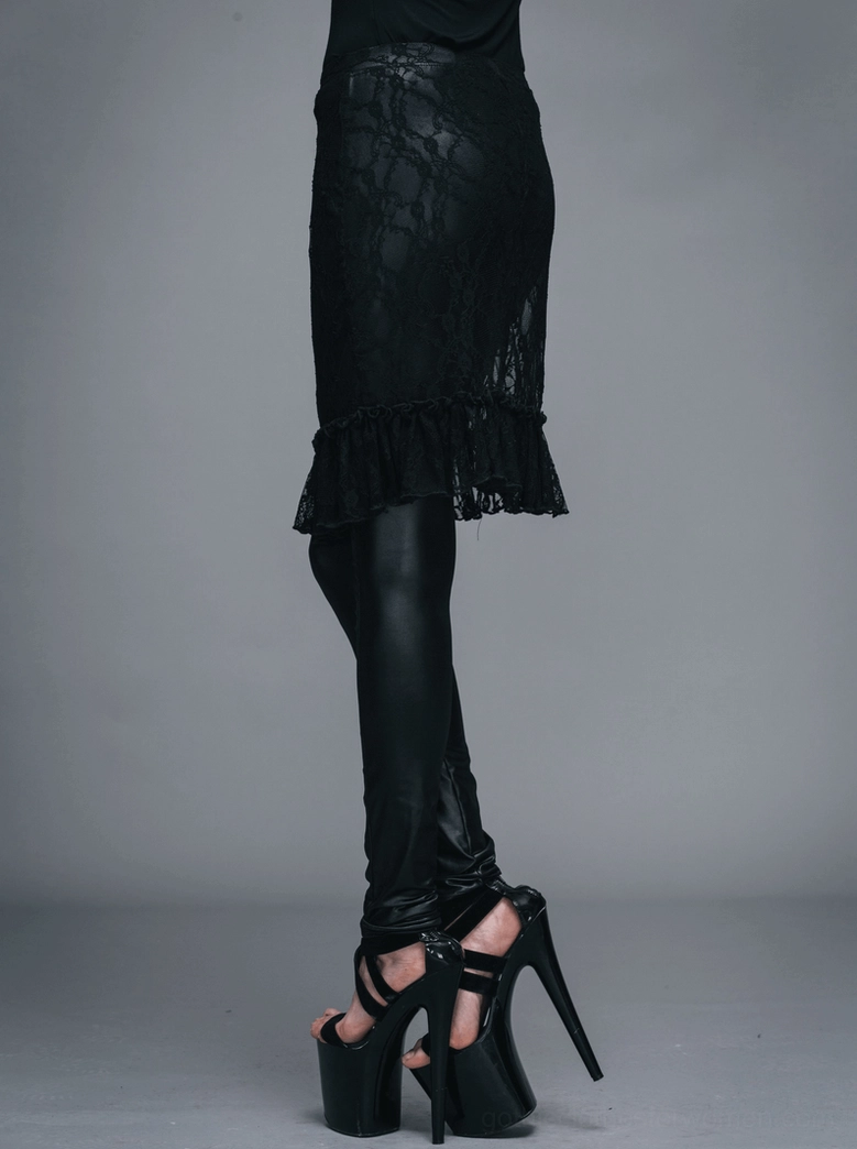 Black faux leather leggings with lace skirt detail, full lower body view emphasizing silhouette and design