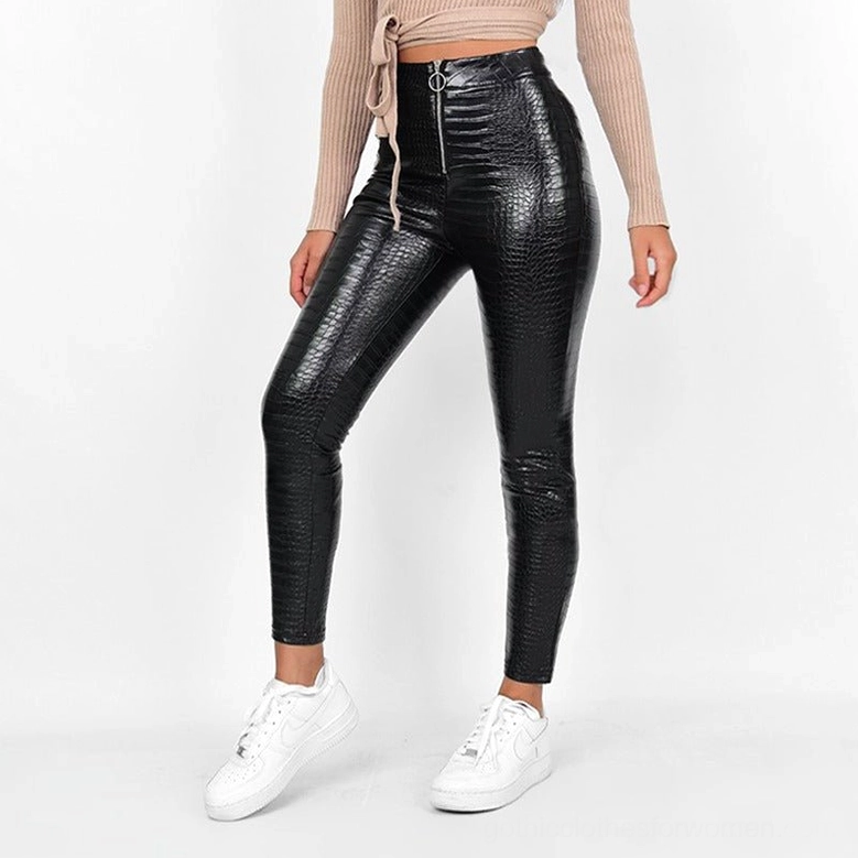 Black high-waist gothic faux leather pencil pants worn on model, showing the elegant silhouette and smooth crocodile-textured material