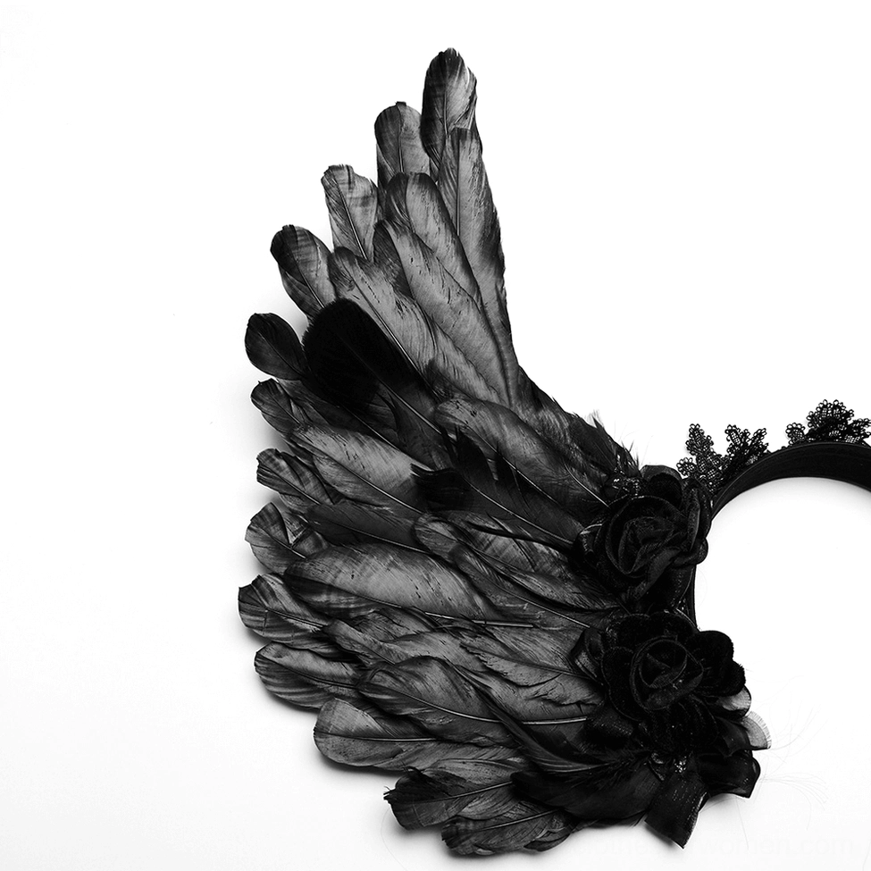 Side profile of black feather wing showing texture detail with layered feathers, black handmade roses, and gothic embellishments