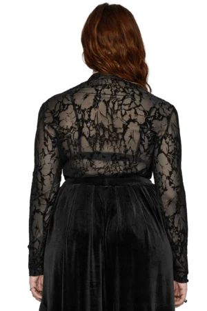 Black floral flocked mesh gothic long sleeve top rear back view on model, demonstrating sheer mesh construction and floral velvet print detail