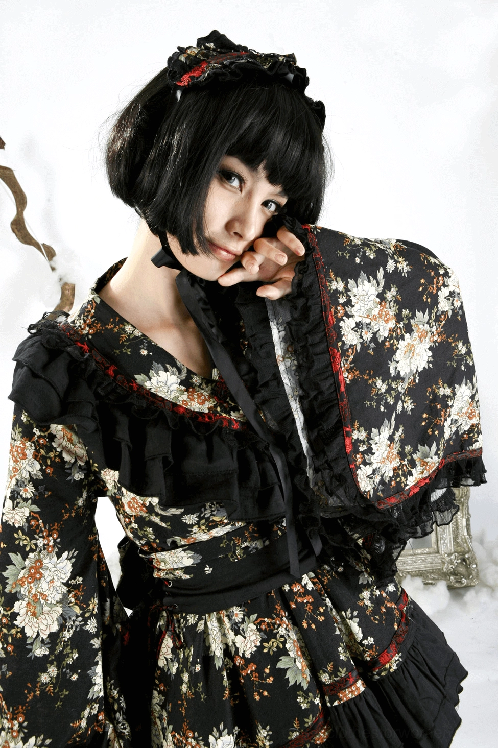 Black floral gothic lolita dress main product shot studio lighting on white background