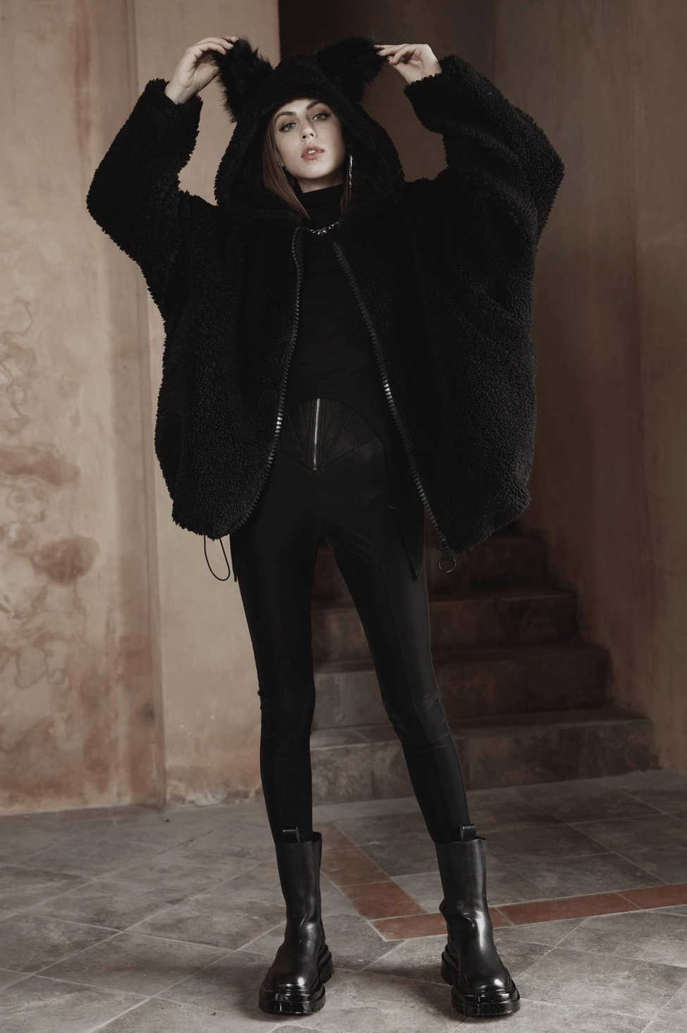 Black fox ear gothic hooded fleece jacket three-quarter view emphasizing oversized silhouette