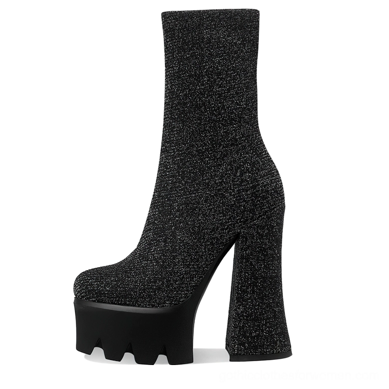 Black glitter platform ankle boots with serrated rubber sole and architectural block heel, gothic sparkle detail