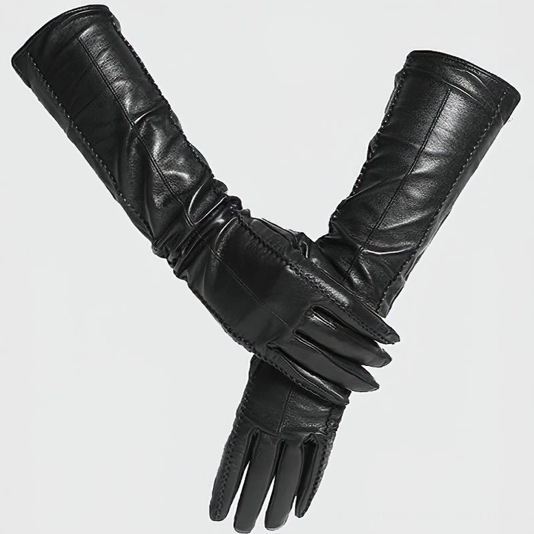Black glossy sheepskin leather gloves with refined finish, low-angle view highlighting material quality