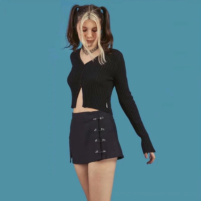 Black A-line gothic mini skirt with safety pin clips and low-waist fit, product display shot