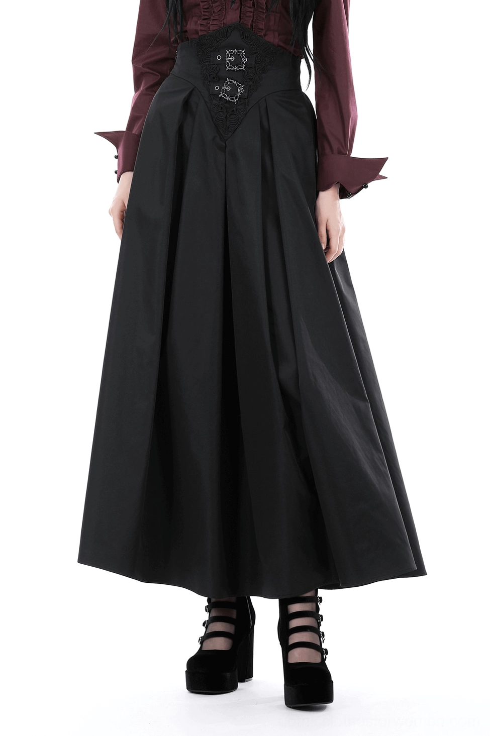 Black A-line gothic skirt front view with ornate lace corset waist belt and silver buckles on model wearing white blouse