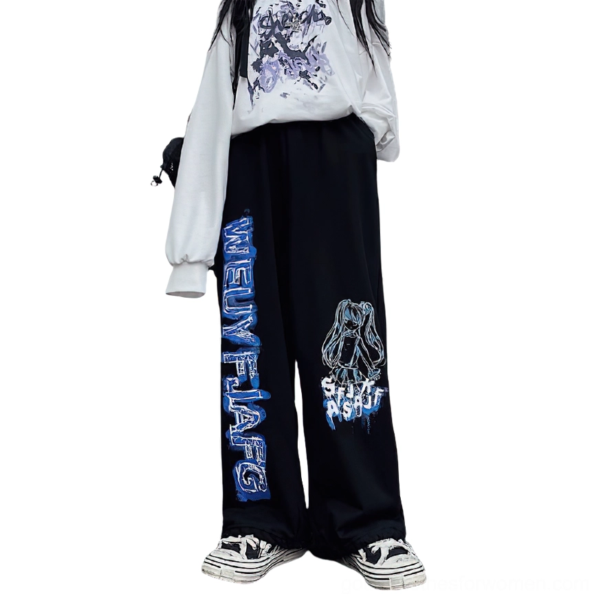 Black gothic wide leg anime print jogger pants back view on model, elastic waistband and full length cut visible