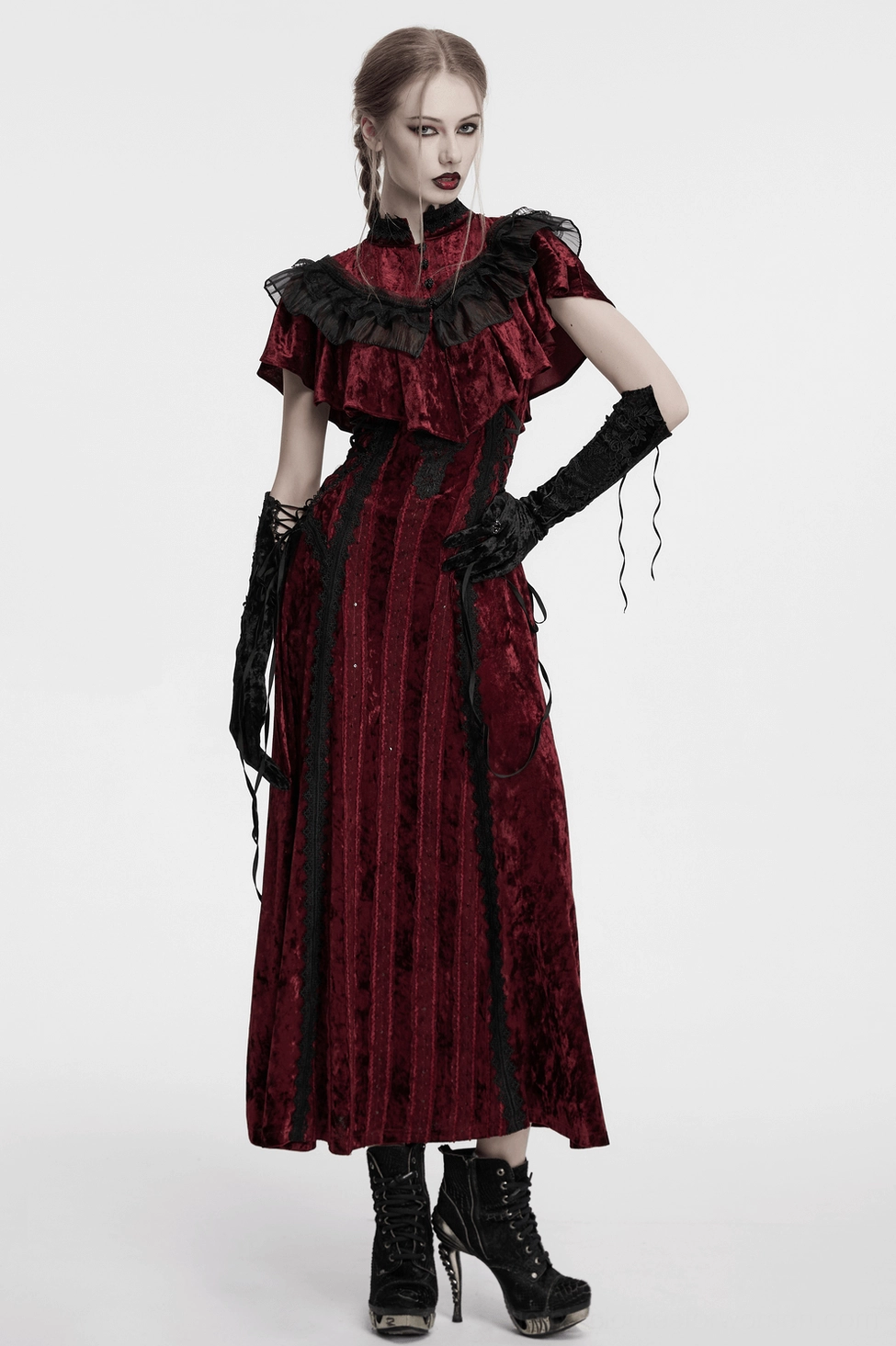 Model wearing complete black gothic outfit with long velvet embroidered arm gloves and platform boots - full body front view