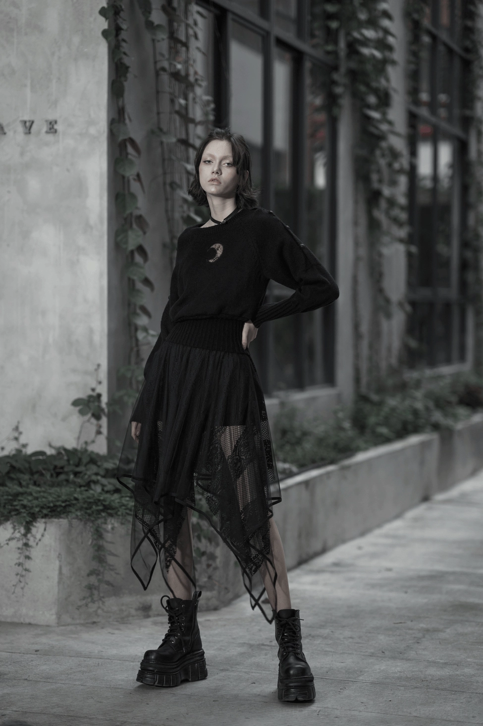 Black gothic asymmetric mesh and lace skirt main product view front pose on model