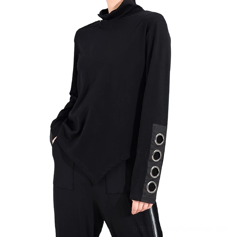 Black gothic asymmetrical top with metal grommet cuff details, full-length sleeves, three-quarter right side view worn by model