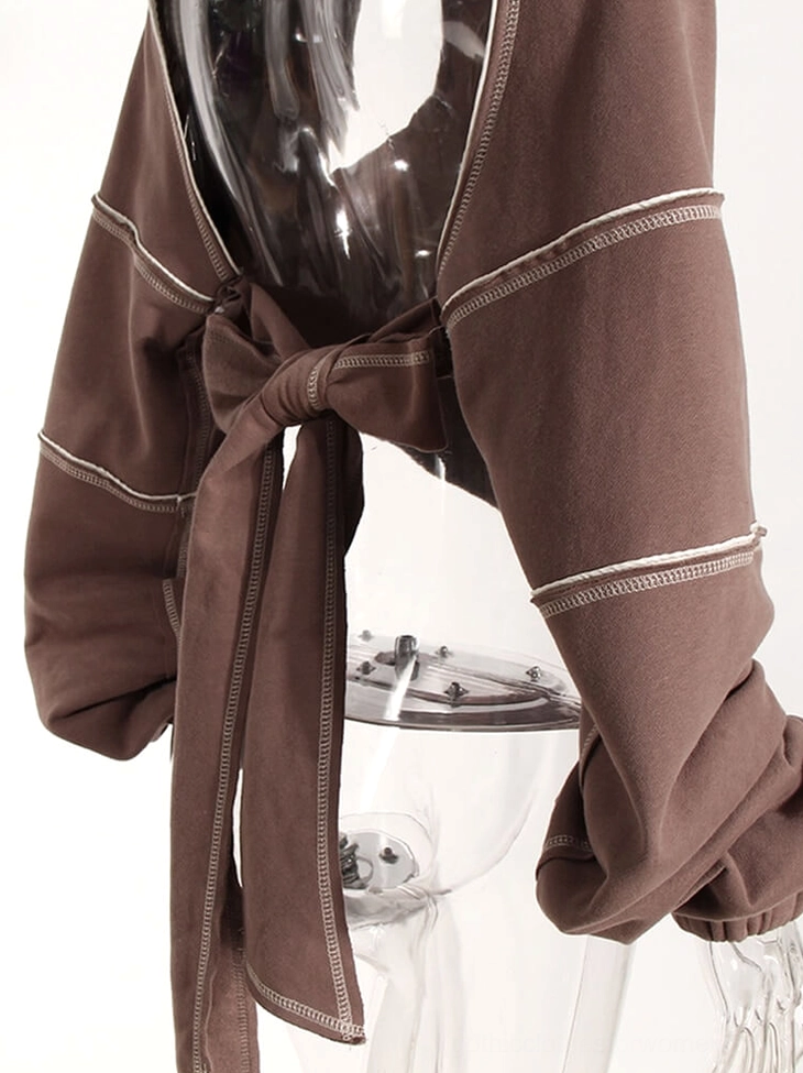 Black gothic backless hoodie full back view on model showing tie design and bishop sleeve details