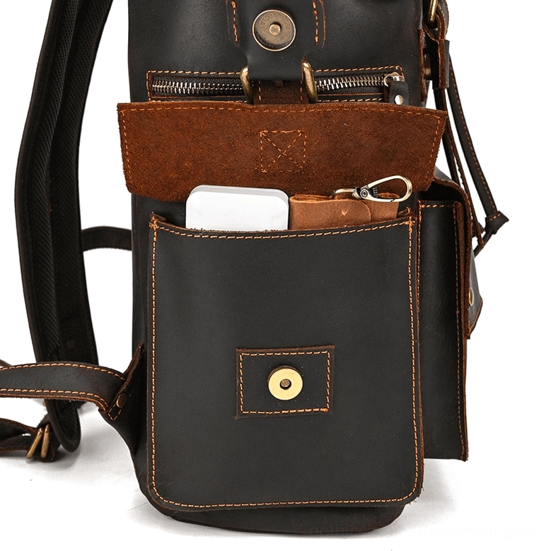 Black leather gothic backpack against dark aesthetic background