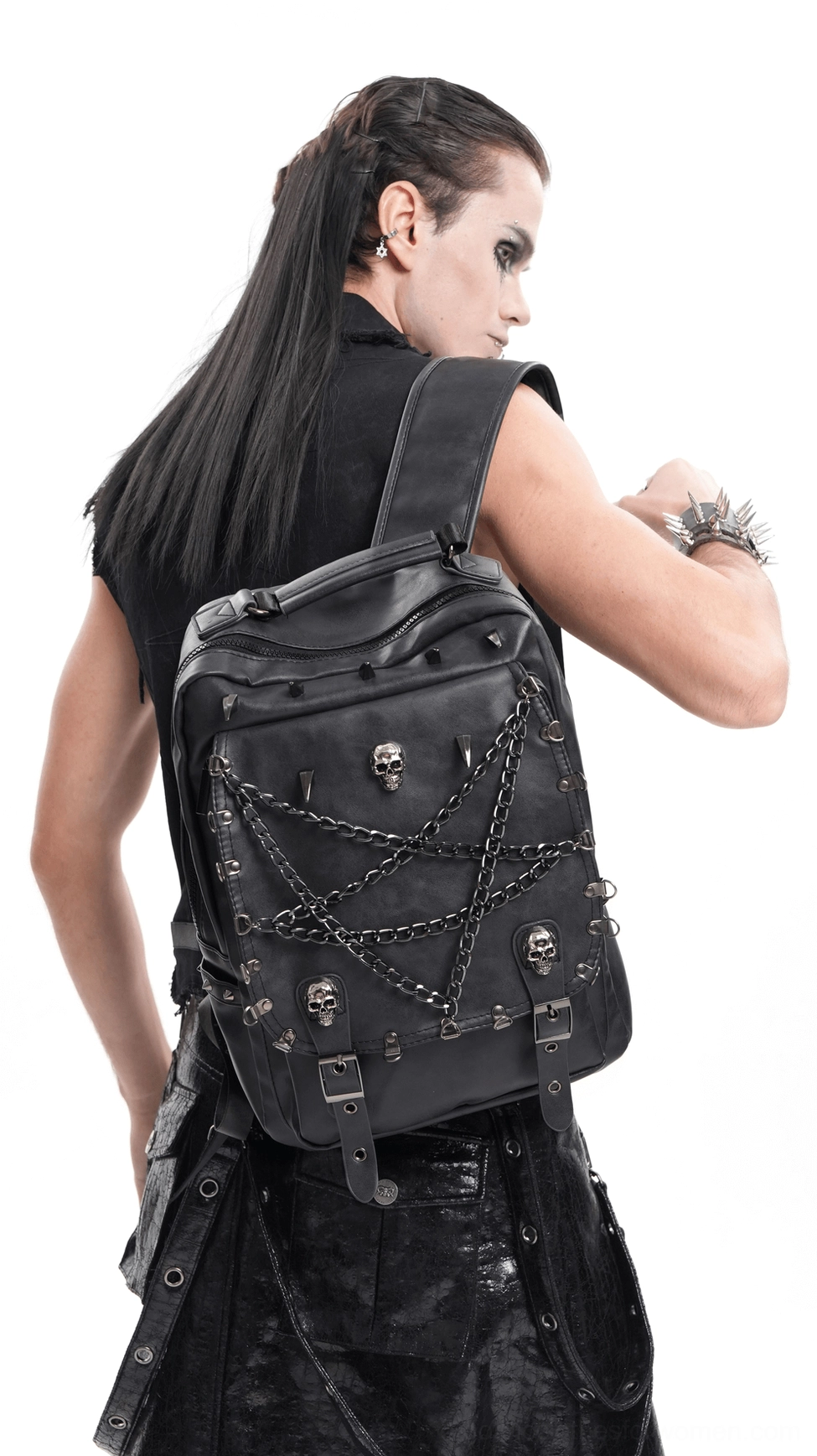 Front three-quarter angle of black gothic backpack with pentagram chains and skull studs on white background