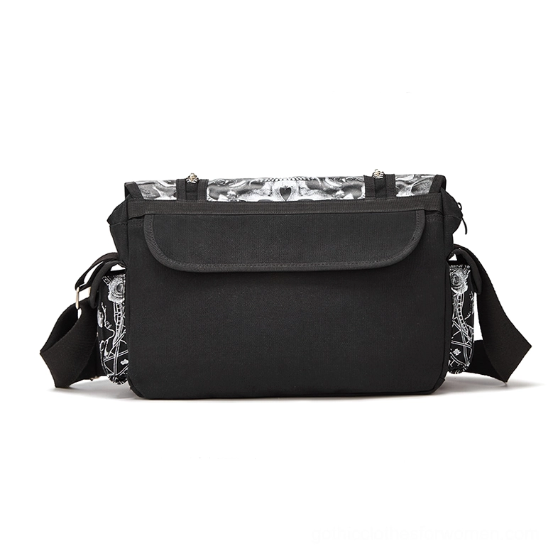 Rear view of black gothic handbag showing solid canvas back and front flap pocket design