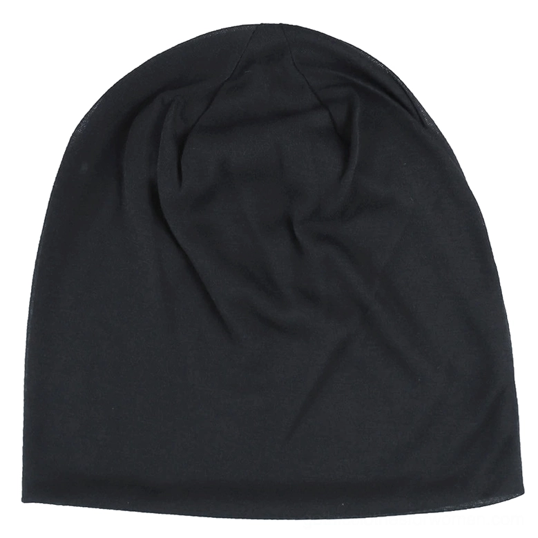 Black gothic slouch beanie front view with central crown seam and ruched design, soft cotton hat