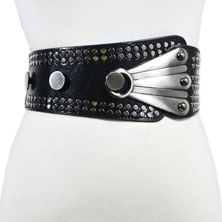 Black studded wide belt worn on mannequin torso showing waist-cinching gothic corset effect and fit demonstration