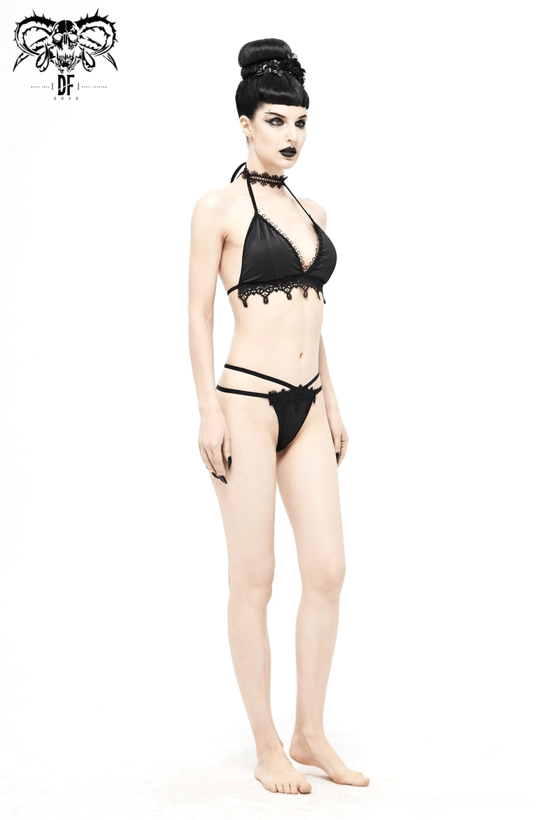 Woman wearing black gothic bikini with choker - full body front pose showing lace appliqué details