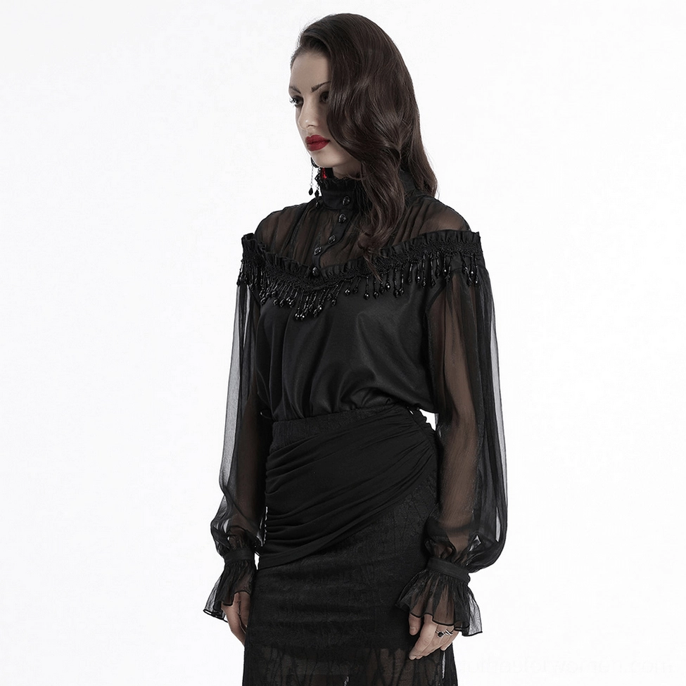 Black gothic blouse with beaded tassel trim - alternative fashion statement piece close-up view