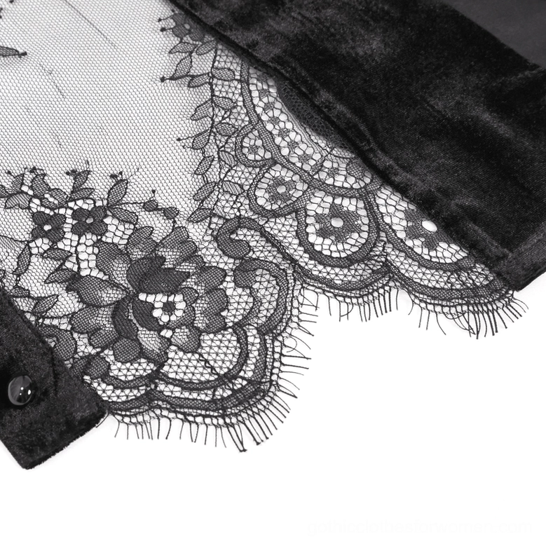 Close-up texture detail of black lace gothic blouse showing eyelash lace trim and sheer mesh fabric construction
