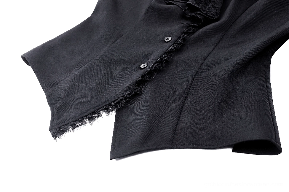 Close-up detail of black gothic Victorian blouse buttoned cuff with lace trim along cuff edge and ruffle sleeve construction