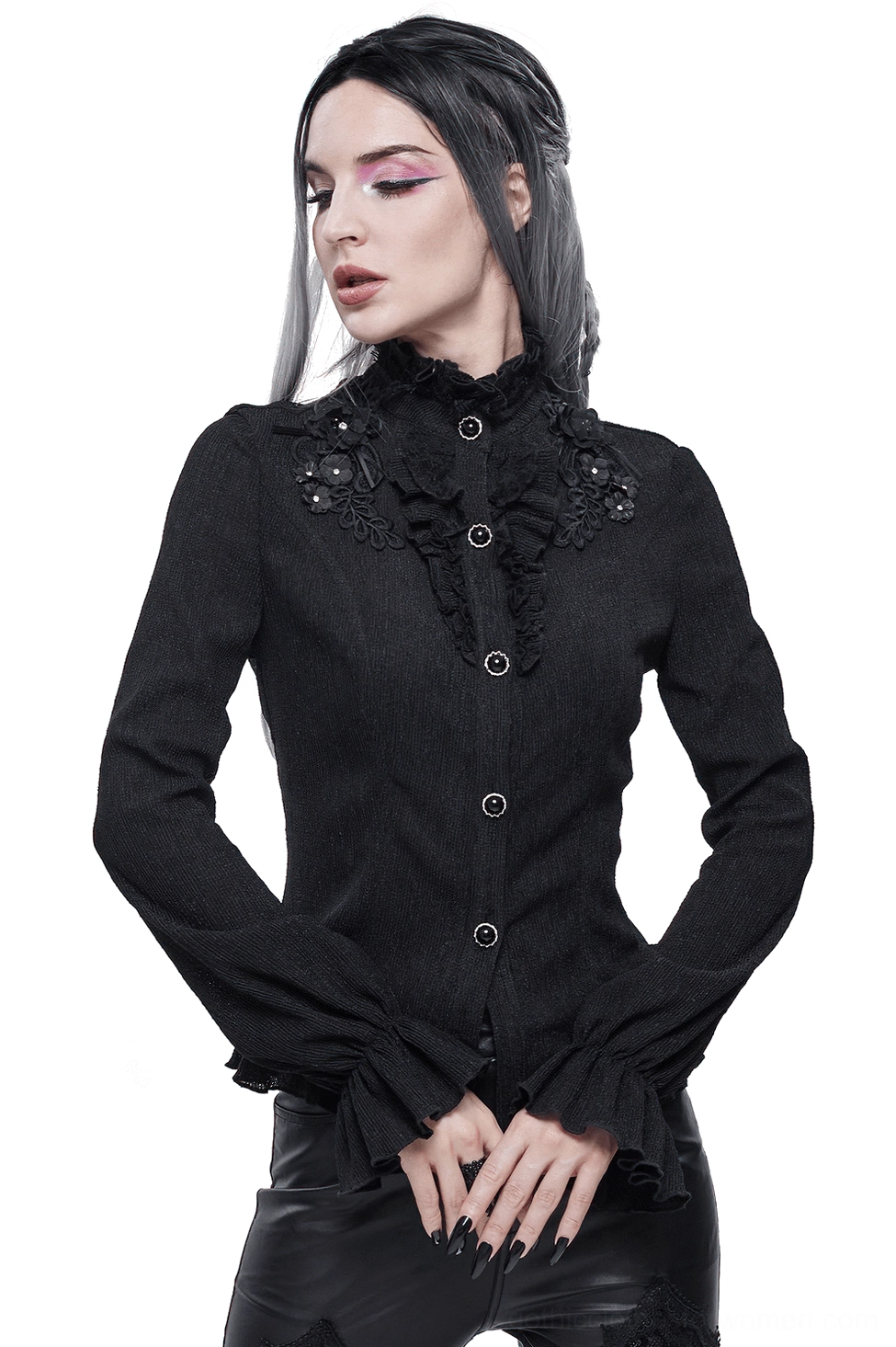 Women's black gothic stand collar blouse with floral appliqué and decorative gem buttons, front three-quarter view on model