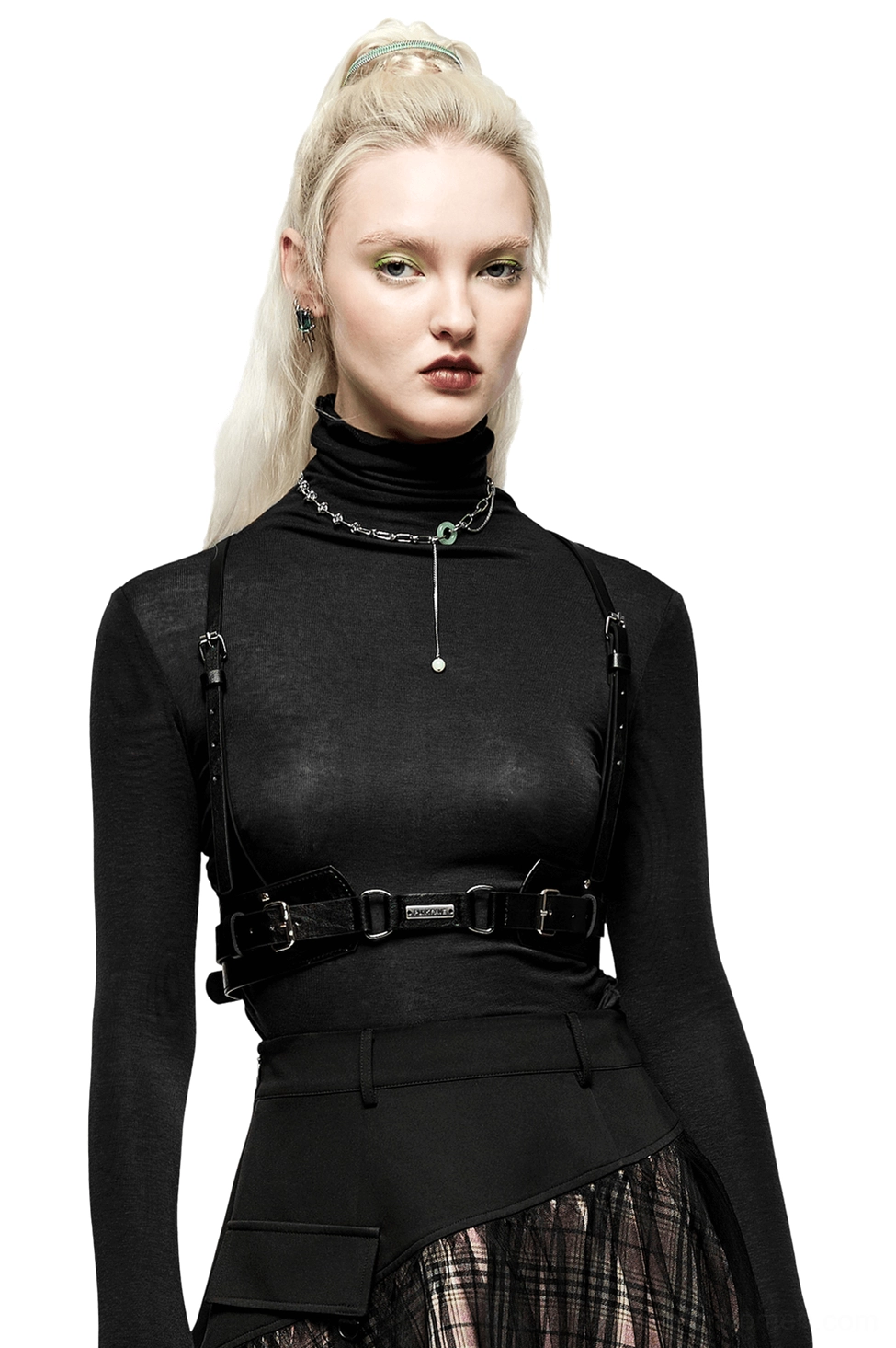 Black gothic body harness front view on model, adjustable shoulder straps and metal nameplate, punk leather chest harness styling