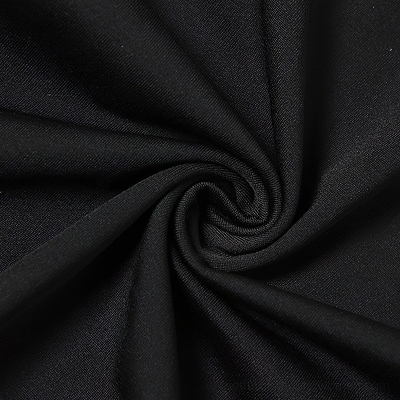 Close-up texture detail of solid black stretch knit fabric used in gothic bodysuit construction