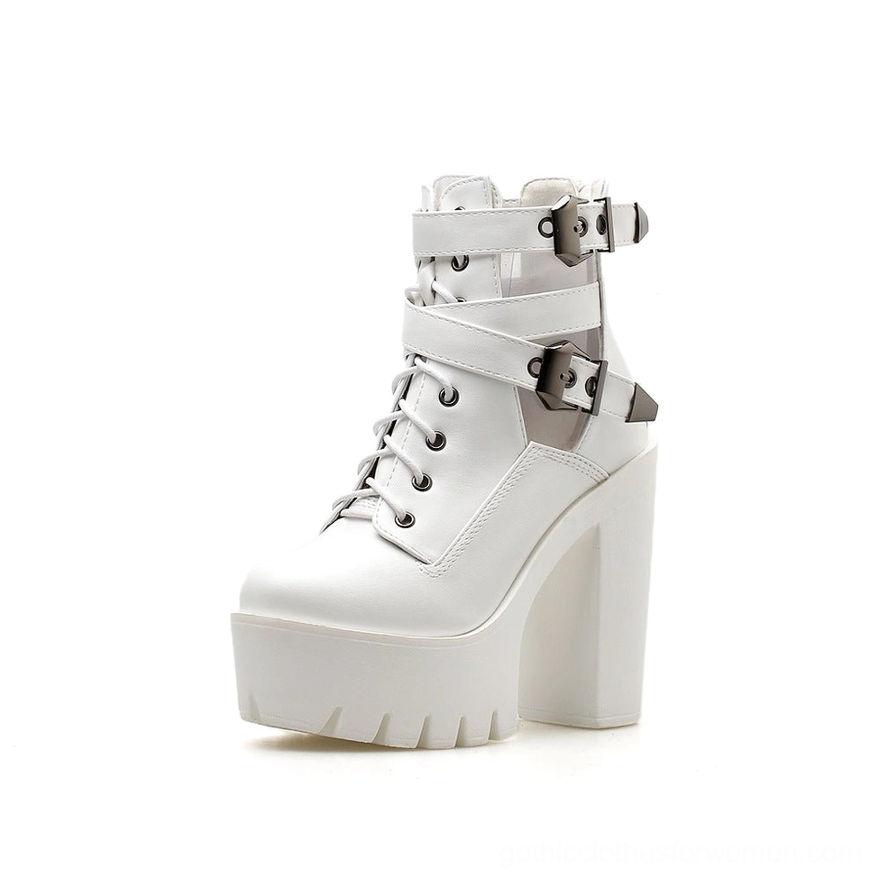 Black gothic platform boots with metal buckle hardware and lace-up closure system, showcasing the square block heel and structural details