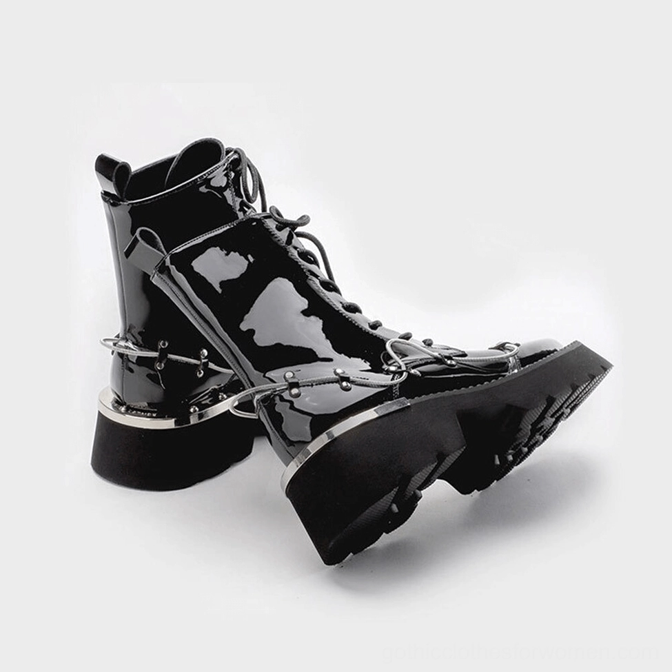 Side profile of black patent leather lace-up gothic boots, displaying rugged outsole and structural design