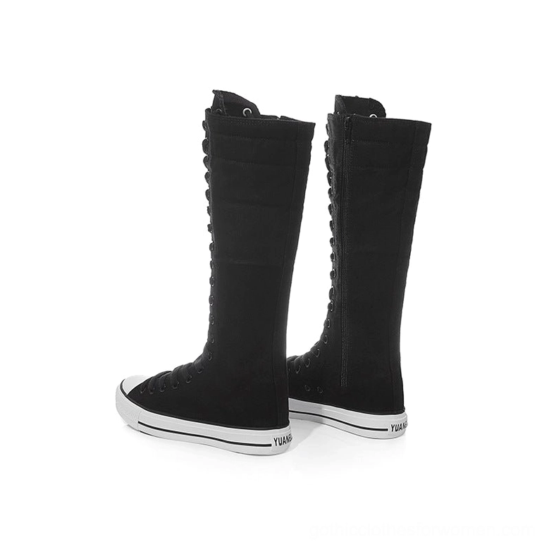Black high-top canvas boots side view with zipper and branded rubber outsole