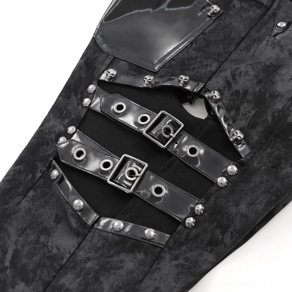 Black gothic buckle pants showing architectural side buckle placement and slim leg silhouette