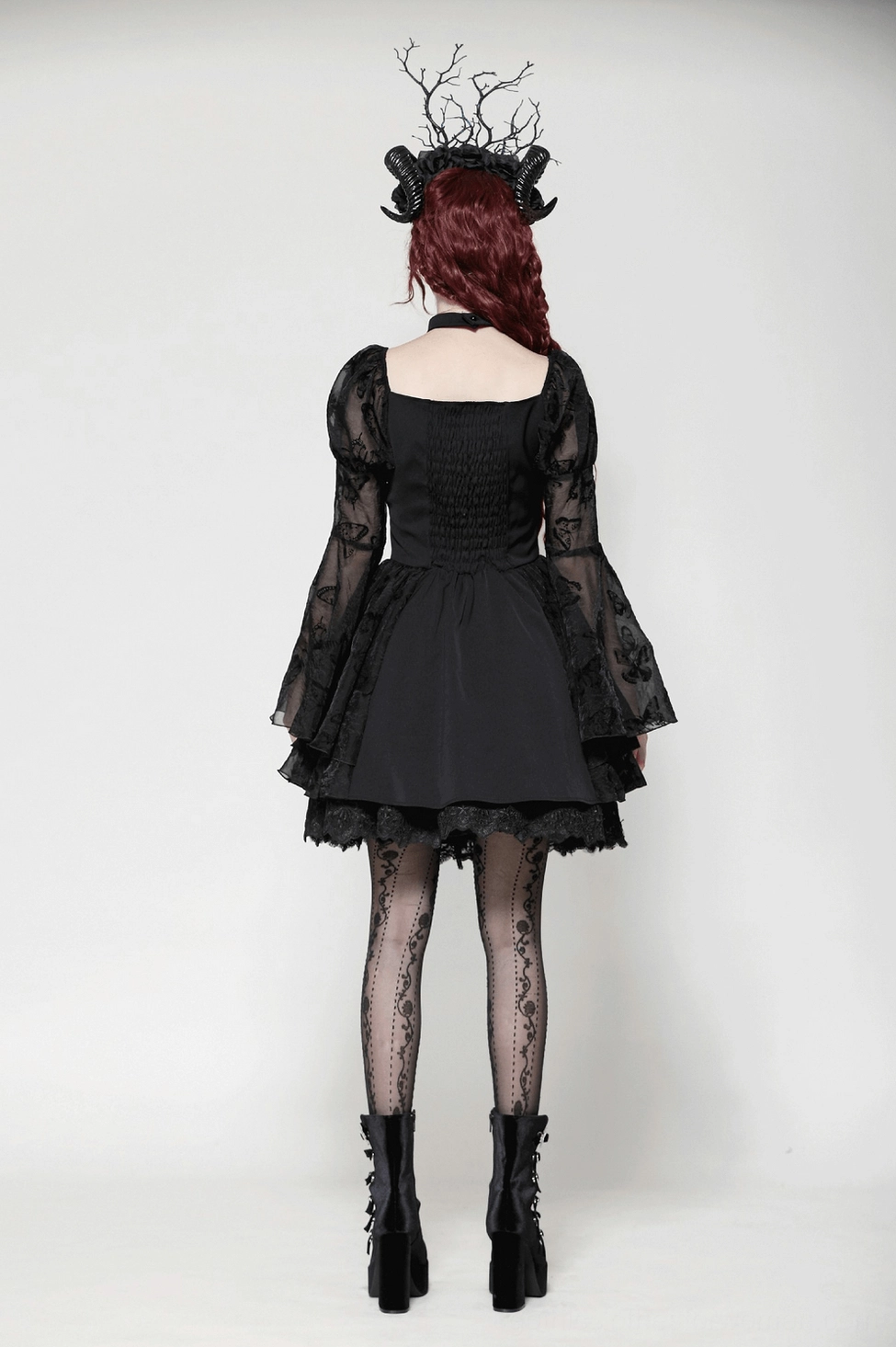 Black gothic butterfly lolita dress styling photo showing complete outfit and aesthetic presentation