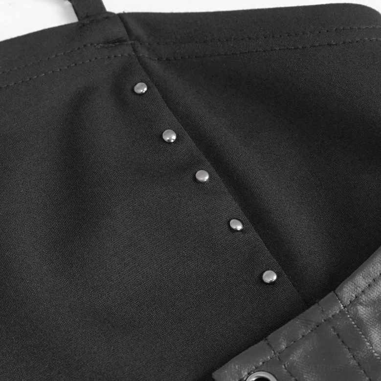 Black gothic cami top featuring metal rivet studs and blended fabric texture detail close-up on white background