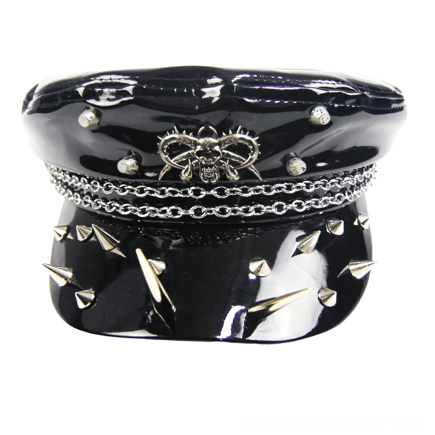 Double metal chains and studded spikes detail on black gothic military hat - flat front shot