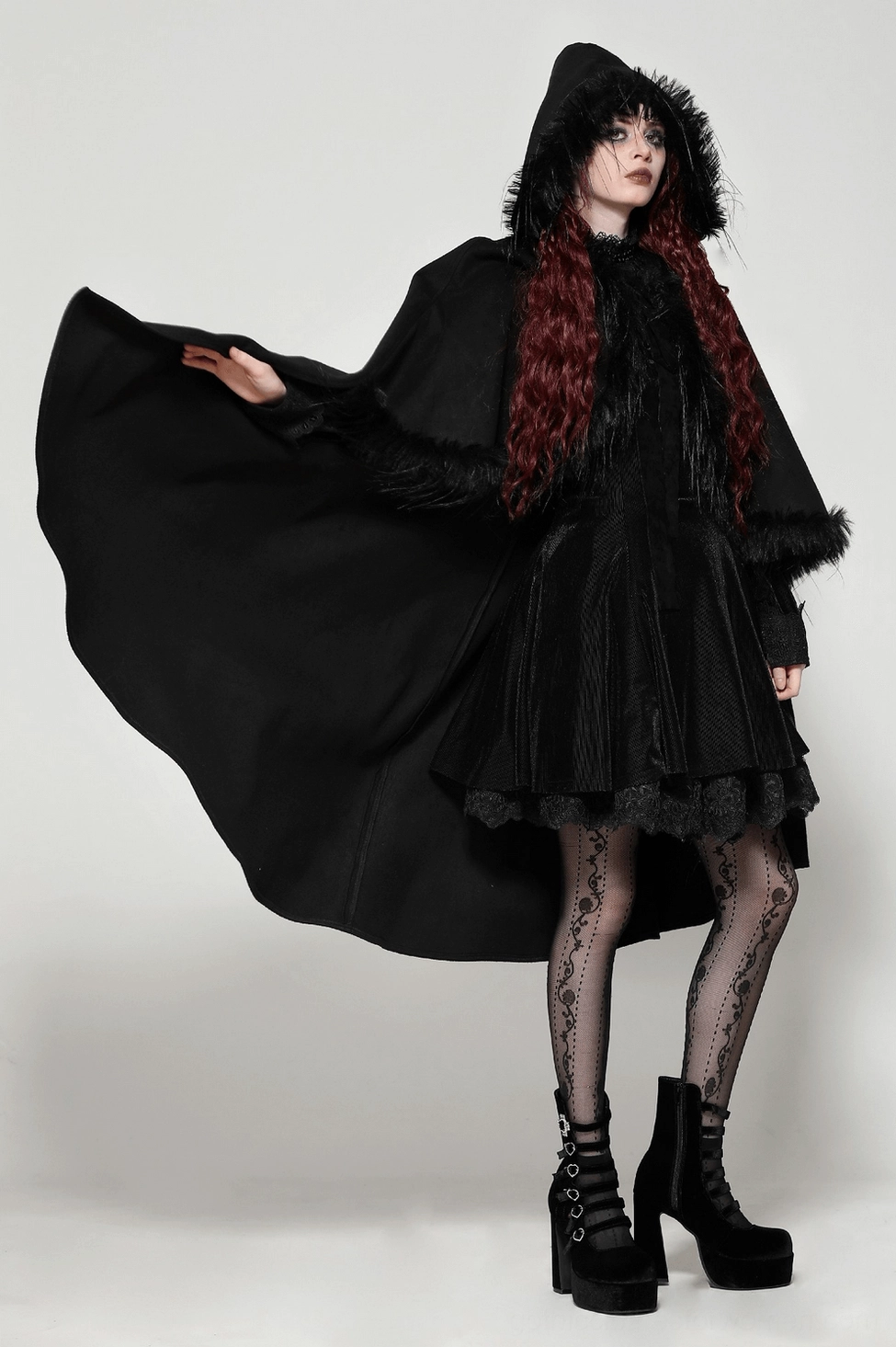 Black gothic cape with luxurious faux fur trim ideal for alternative fashion and goth culture