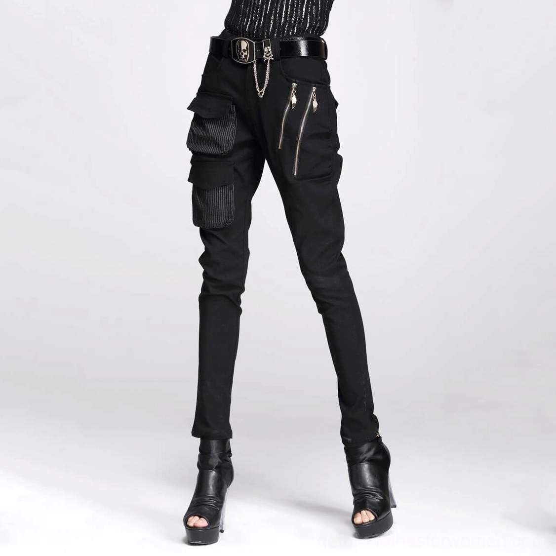 Black gothic cargo pencil pants front view on model wearing platform heels and skull belt accessory