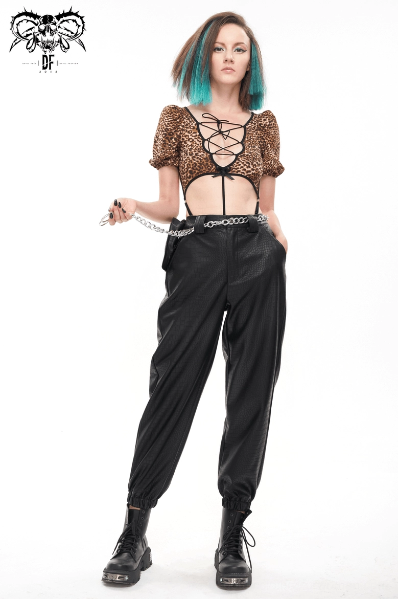 Black gothic cargo pants with mini waistbag and rivet details flat lay view
