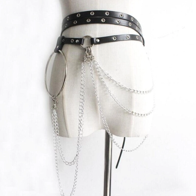 Black gothic chain waist belt displayed on mannequin, angled back view showing layered silver chains, large metal hoop, and detailed chain construction in studio setting